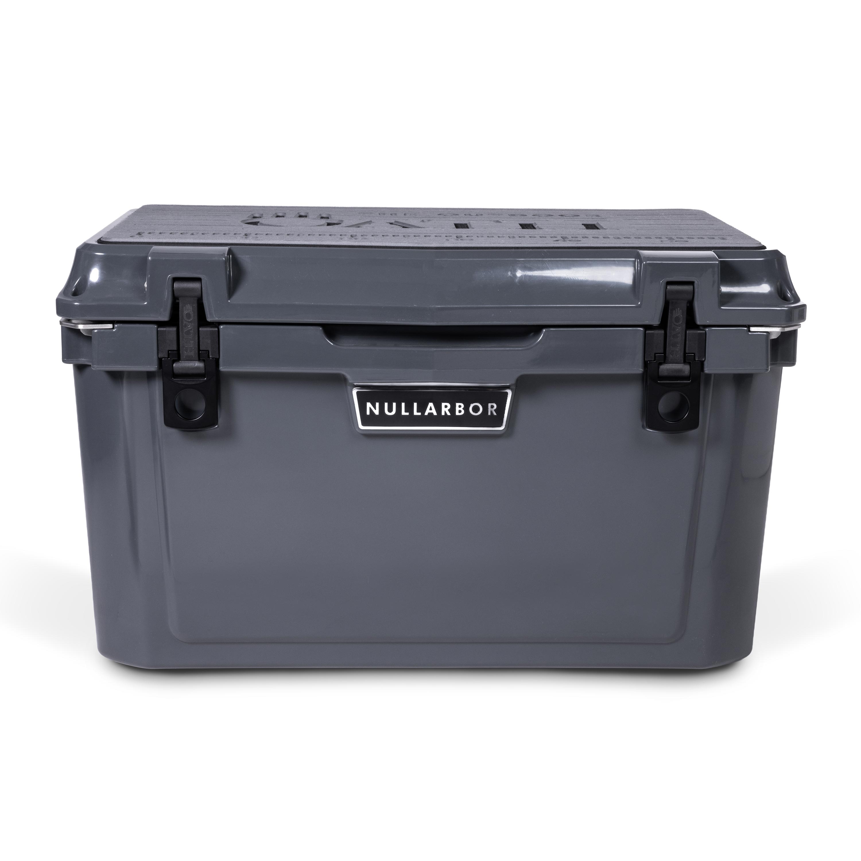 Front view of closed medium 43 litre dark grey cooler box with 2 easy lock latches on front and bottle openers on each corner. Grey foam mat on lid with fish catch ruler.