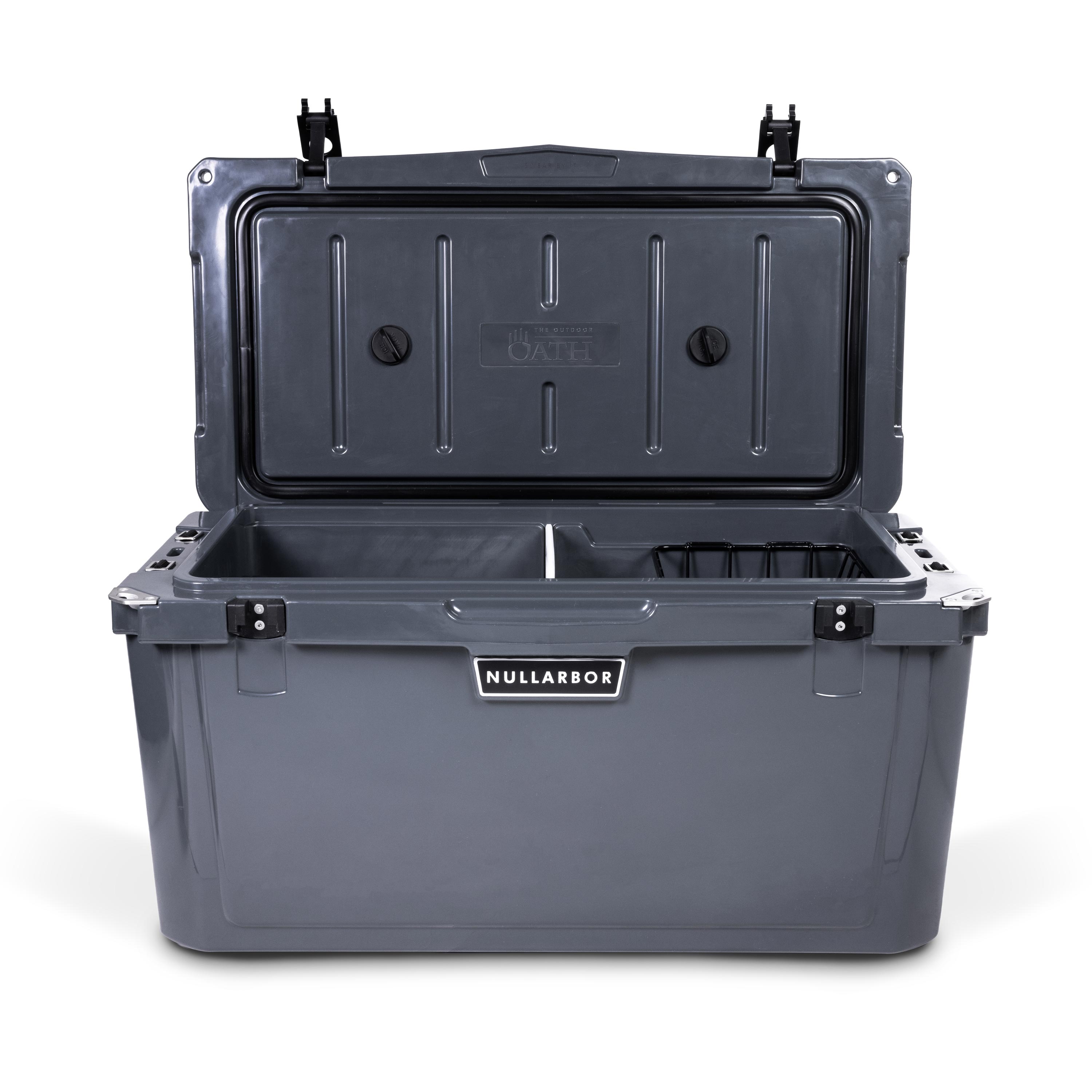 Front view of open large 71 litre dark grey cooler box with 2 easy lock latches on lid and bottle openers on each corner. Food divider / chopping board and wire food basket inside.