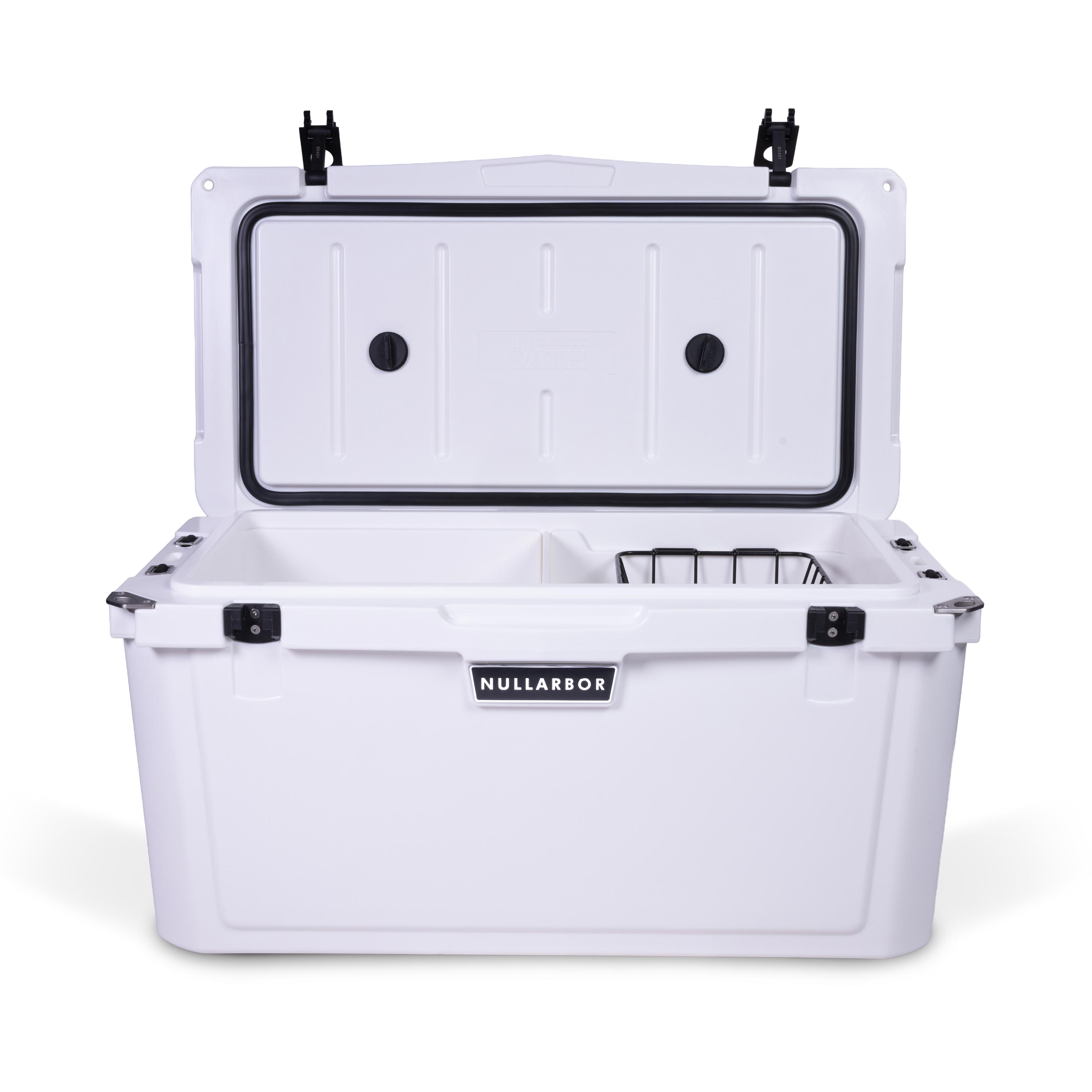 Front view of open large 71 litre white cooler box with 2 easy lock latches on lid and bottle openers on each corner. Food divider / chopping board and wire food basket inside.