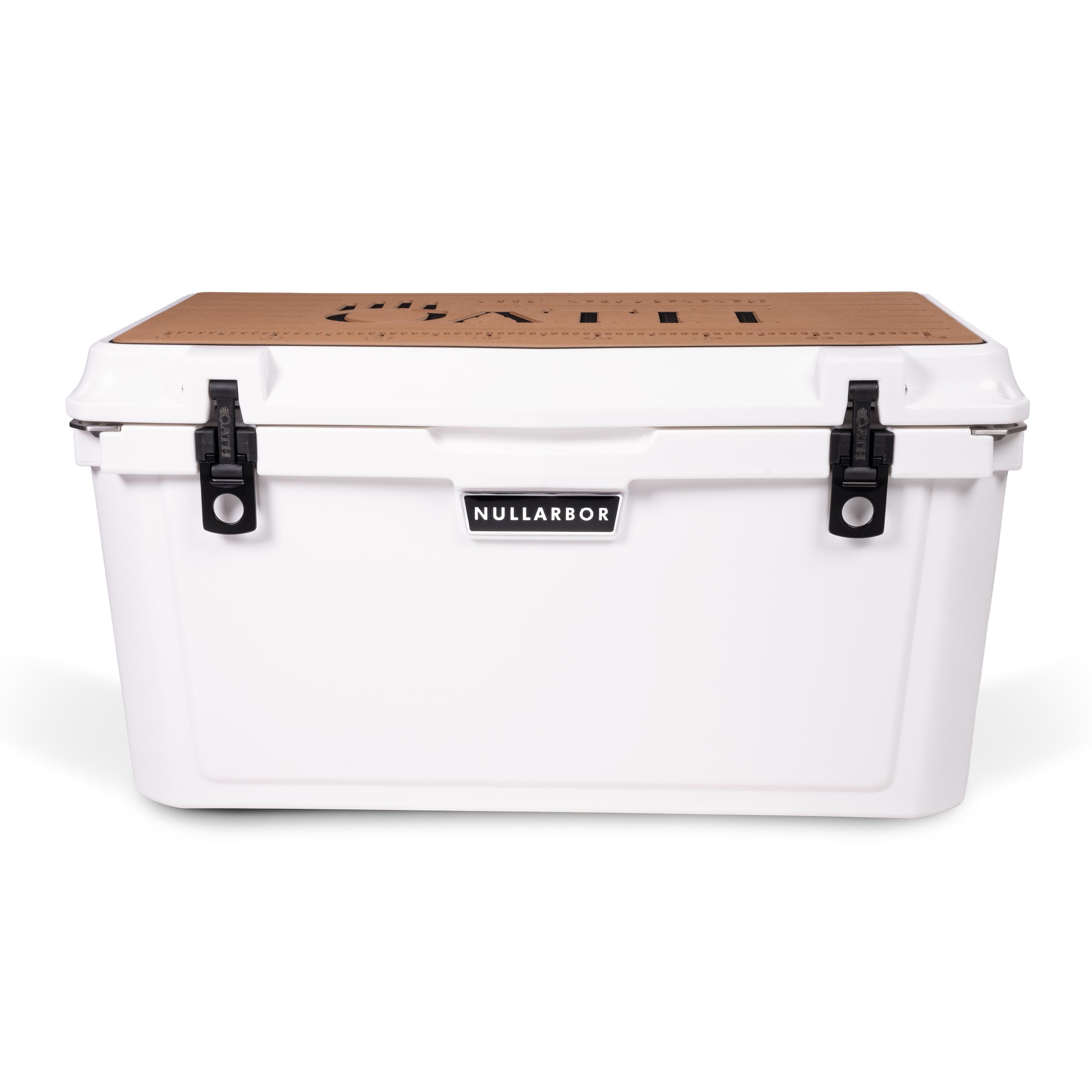 Front view of closed large 71 litre white cooler box with 2 easy lock latches on front and bottle openers on each corner. Tan foam mat on lid with fish catch ruler.