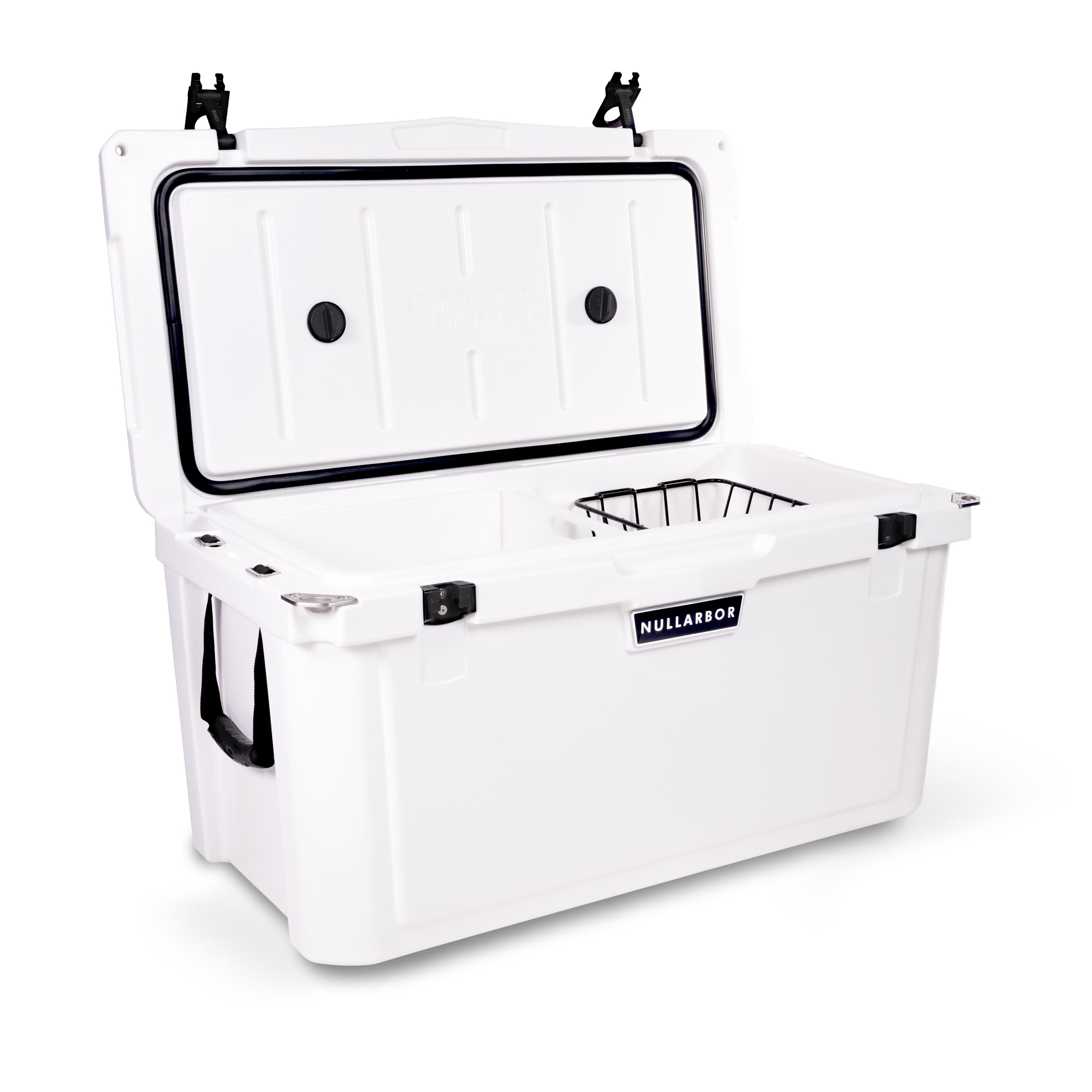 Left side 45 degree view of open large 71 litre white cooler box with side handle, 2 easy lock latches on lid and bottle openers on each corner. Food divider / chopping board and wire food basket inside.