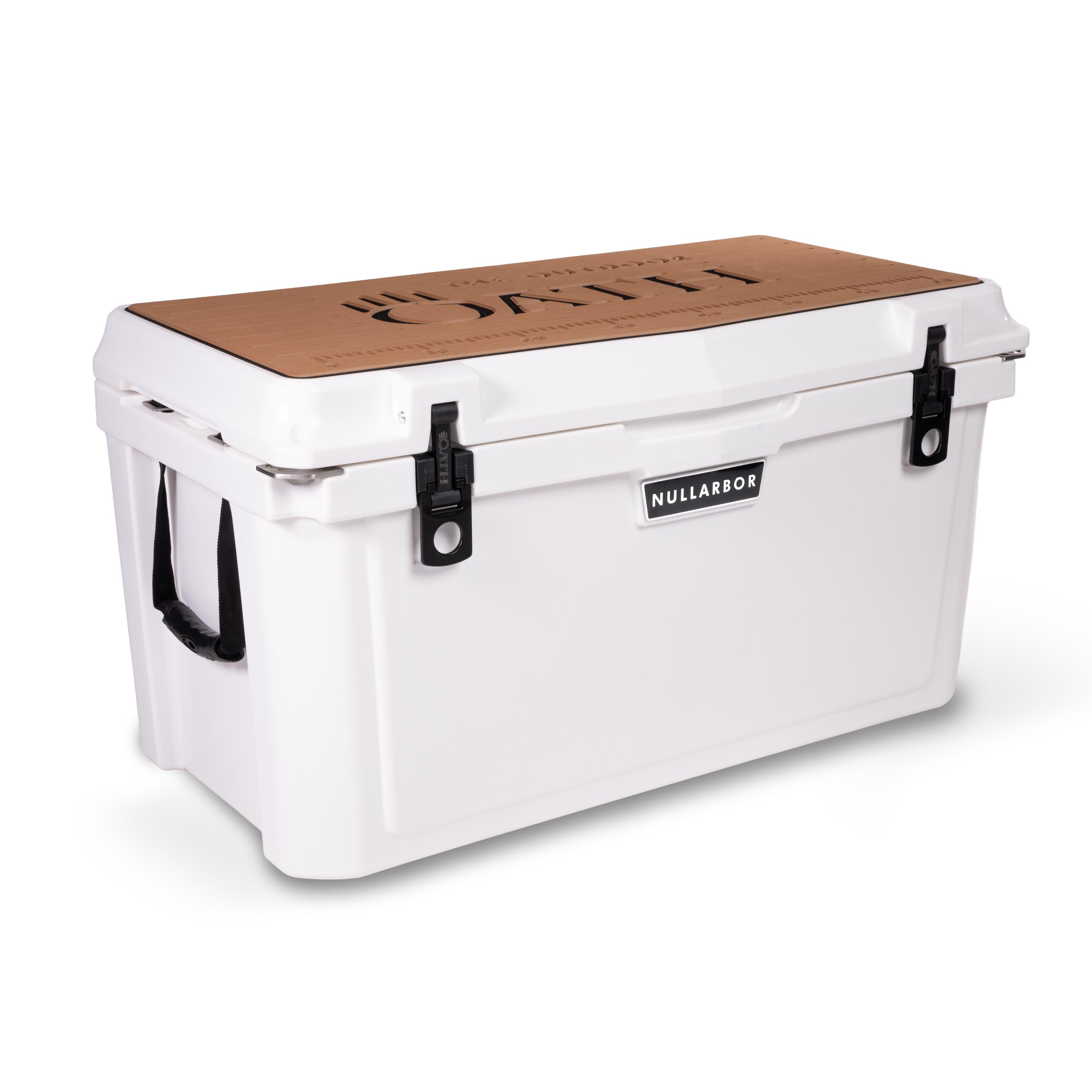 Left side 45 degree view of closed large 71 litre white cooler box with side handle, 2 easy lock latches on front and bottle openers on each corner. Tan foam mat on lid with fish catch ruler.