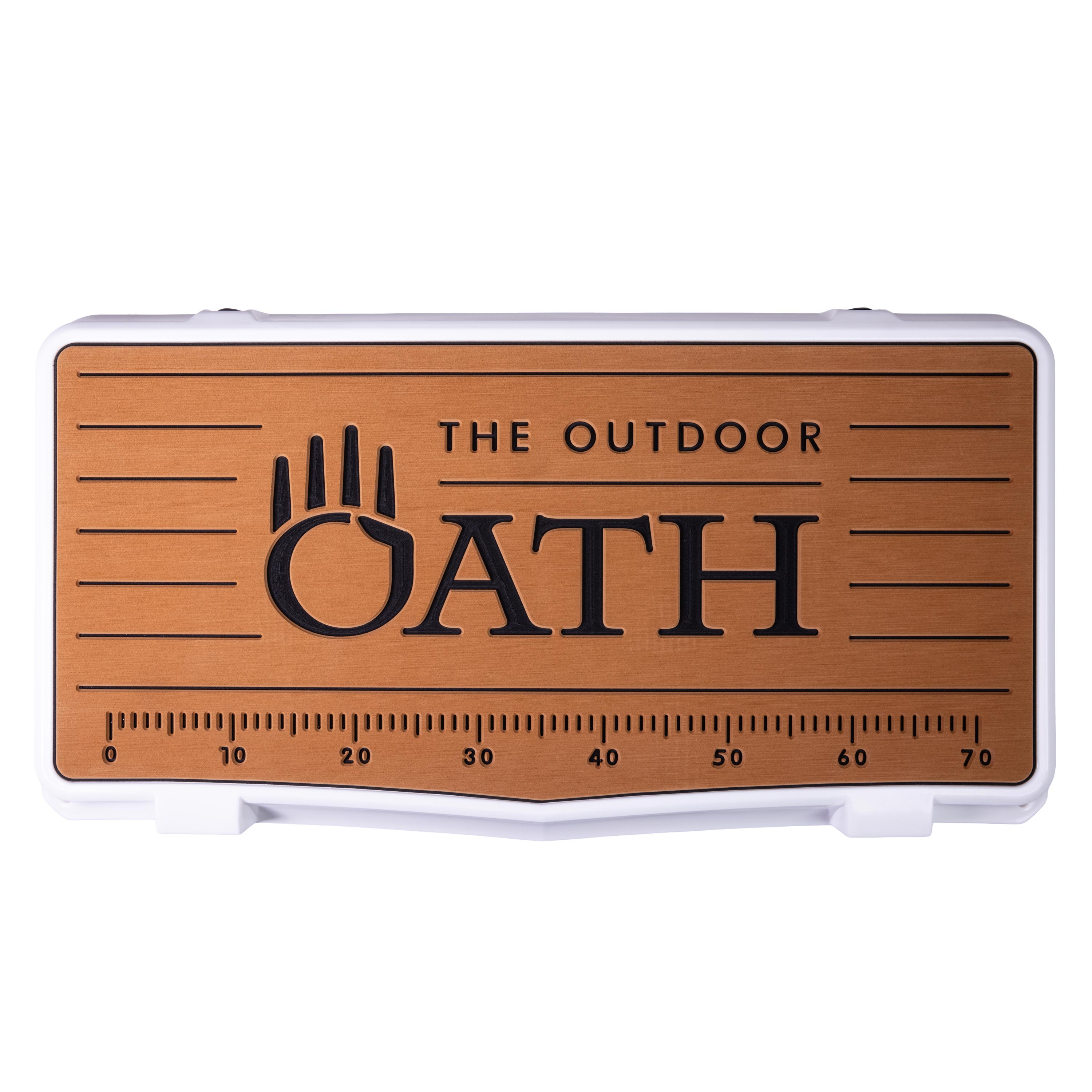 Top view of closed large 71 litre white cooler box with tan foam mat and fish catch ruler