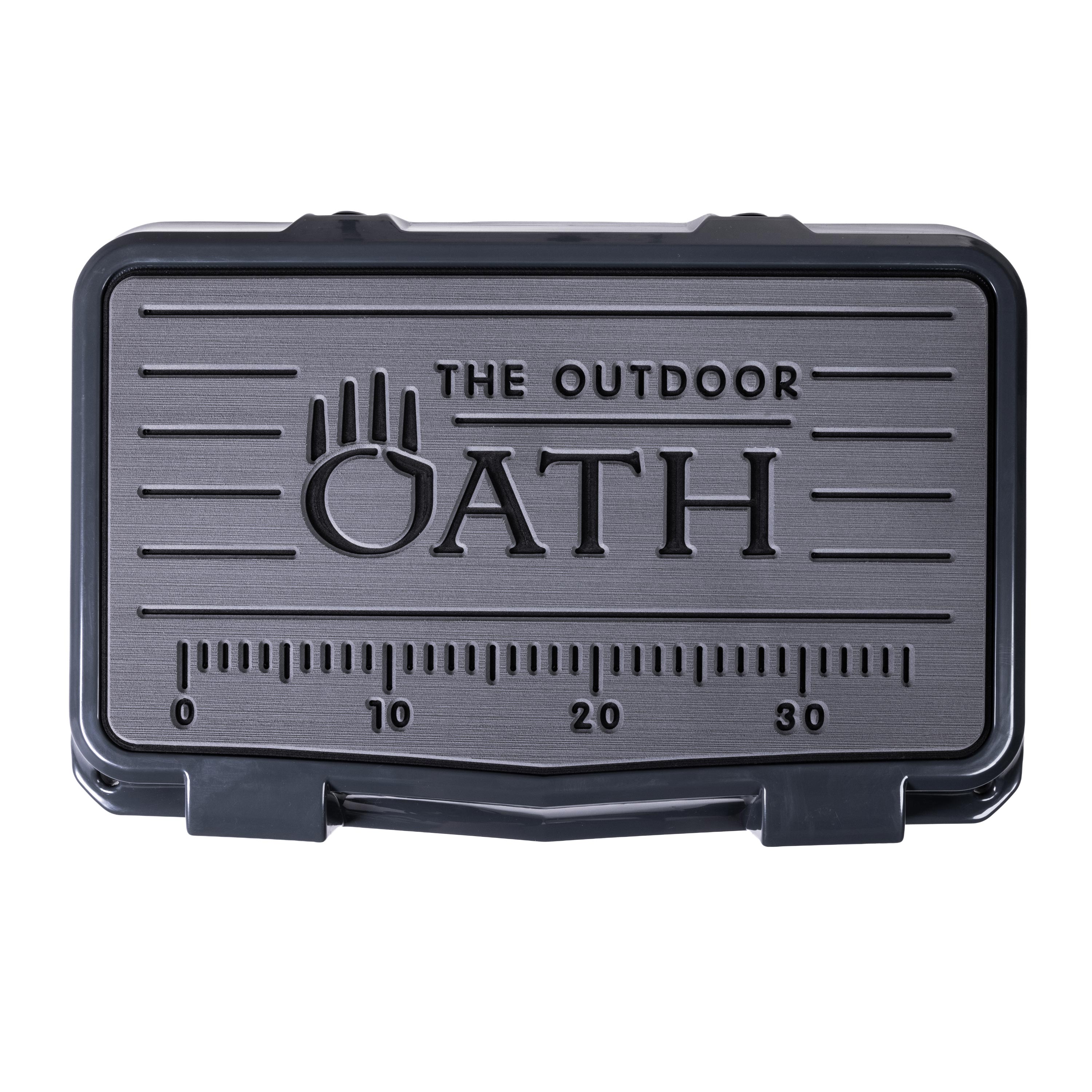 Top view of closed small 19 litre dark grey cooler box with grey foam mat and fish catch ruler