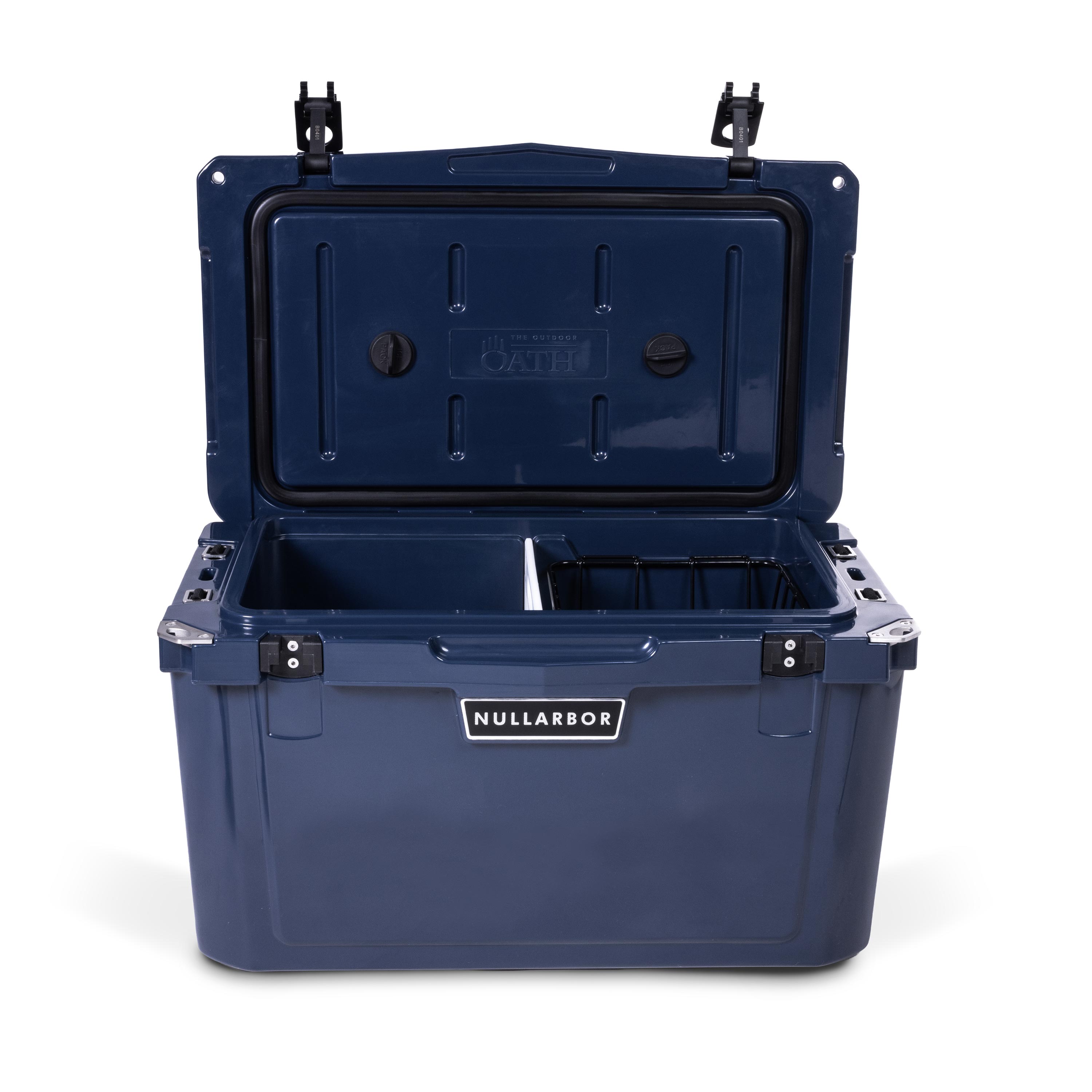 Front view of open medium 43 litre blue cooler box with 2 easy lock latches on lid and bottle openers on each corner. Food divider / chopping board and wire food basket inside.