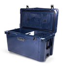 Right side 45 degree view of open large 71 litre blue cooler box with side handle, 2 easy lock latches on lid, bottle openers on each corner. Pressure release valve and leak proof easy flow drainage plug on side. Food divider / chopping board and wire food basket inside.